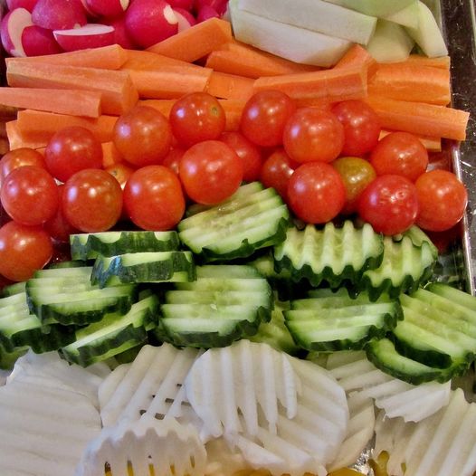 Plate of vegetables and snacks