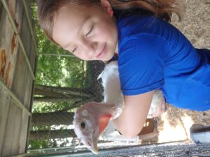 girl holding turkey