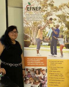 Sthefany with EFNEP poster